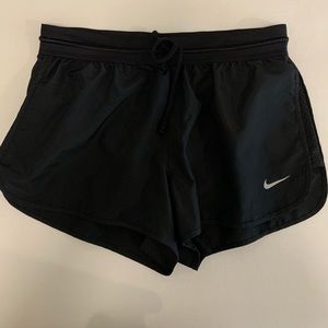 Black Nike running shorts